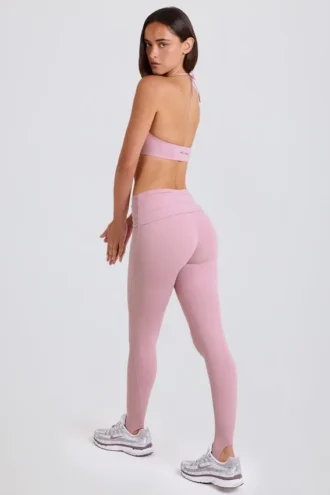 Foldover mid-rise stirrup-legging in mauve