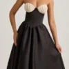 Gabrielle strapless midi-jurk met korset in zwart