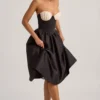 Gabrielle strapless midi-jurk met korset in zwart
