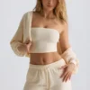 Geborsteld jersey cropped bolero met capuchon in ecru