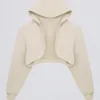 Geborsteld jersey cropped bolero met capuchon in ecru