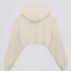 Geborsteld jersey cropped bolero met capuchon in ecru
