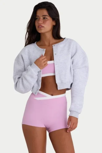 Geborsteld jersey cropped vest met knopen in grijs gemêleerd