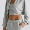 Geborstelde jersey cropped bolero met capuchon in mistgrijs