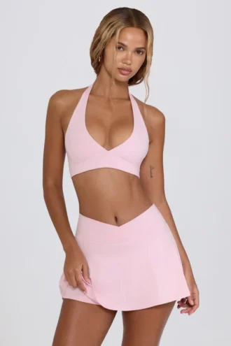 Geborstelde jersey mini-skort met gekruiste band in lichtroze gemêleerd