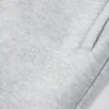Geborstelde katoenen jersey joggingbroek met middelhoge taille en relaxte pasvorm in grijs gemêleerd