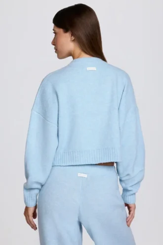 Gebreid kort vest in poederblauw