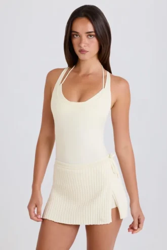 Geribbelde gebreide skort met strik in crème