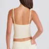 Geribbelde tanktop met strik in crème