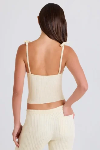 Geribbelde tanktop met strik in crème