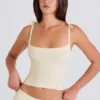 Geribbelde tanktop met strik in crème