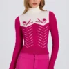 Getailleerde gebreide top met lange mouwen in magenta roze