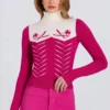 Getailleerde gebreide top met lange mouwen in magenta roze