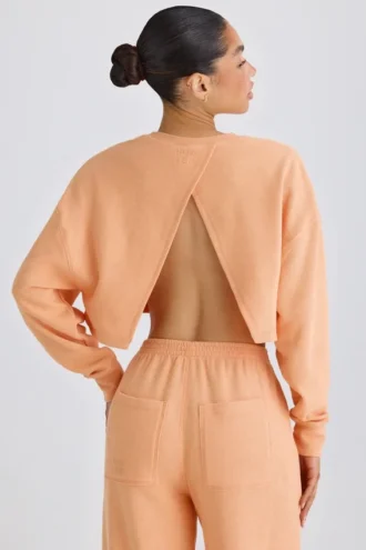 Getextureerd katoenen jersey cropped sweatshirt met open rug in perzik