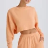 Getextureerd katoenen jersey cropped sweatshirt met open rug in perzik