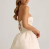 Gloriana Midaxi-jurk met strikdetail en bubbelzoom in ivoor