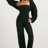 Grof gebreide bandeau-Jumpsuit met uitlopende pijpen in zwart