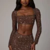 Thalassa doorschijnende mini-rok met versieringen en V-taille in diep cacao
