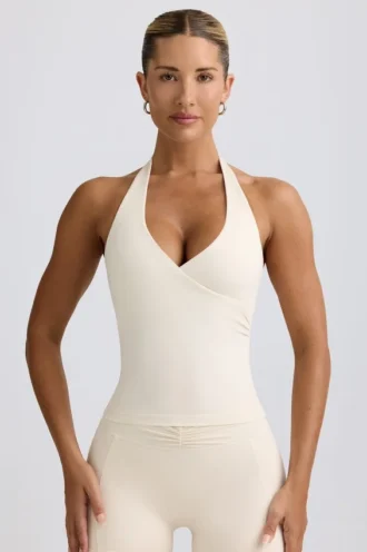 Halterneck tanktop met open rug in ivoorkleurig gemêleerd