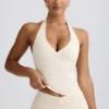 Halterneck tanktop met open rug in ivoorkleurig gemêleerd