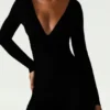 Helene Modal gerimpelde jumpsuit met diepe halslijn en uitlopende pijpen in zwart