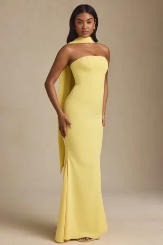 Imogene strapless jurk met sjaaldetail in pastelgeel