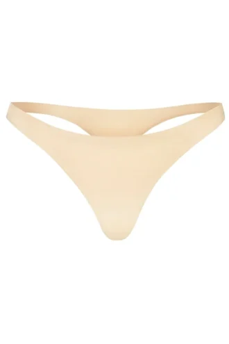 Intimates naadloze gebreide string in warm perzik