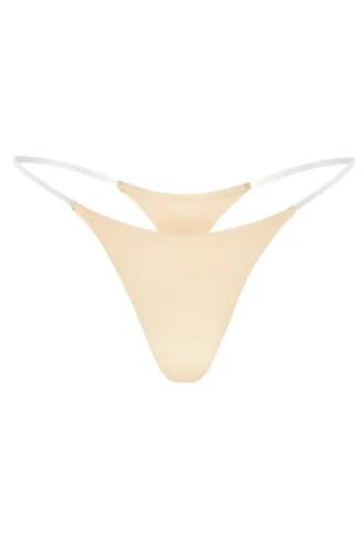 Intimates Naadloze gebreide string met transparante bandjes in Warm Peach