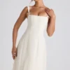 Isadora midi-jurk met strikdetail en plooien in ivoorkleur