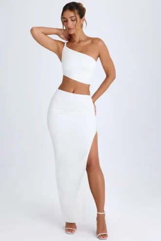 Ishaana gerimpelde maxi-rok met asymmetrische taille in wit