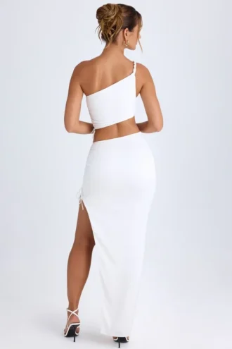 Ishaana gerimpelde maxi-rok met asymmetrische taille in wit