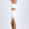 Ishaana gerimpelde maxi-rok met asymmetrische taille in wit