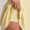 Jaida Modal off-shoulder A-lijn minijurk in Lemon Sherbet