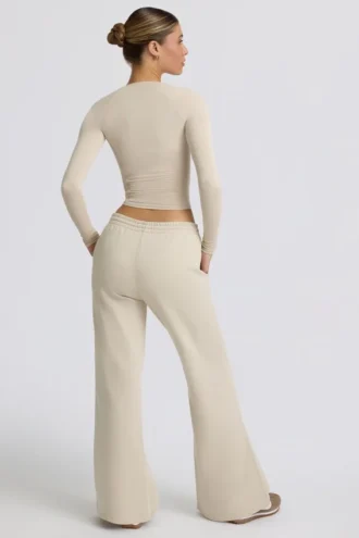Joggingbroek met lage taille en wijde pijpen in ivoorkleur