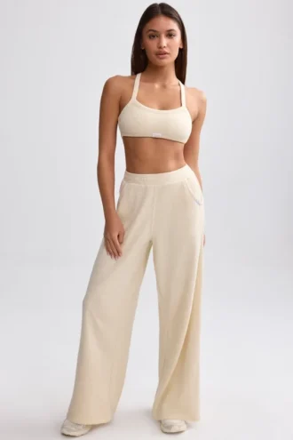 Joggingbroek met wijde pijpen van badstof in crème