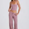 Joggingbroek met wijde pijpen van geribd breisel in mauve