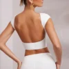 Juno crop top met kapmouwtjes en open rug in wit