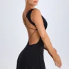 Kalista mini-jurk met diepe uitsnijding in zwart