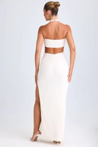 Kalyani maxi-jurk met uitsnijdingen en ruches in wit