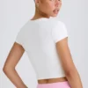Kort T-shirt van stretchkatoenjersey met grafische print in wit