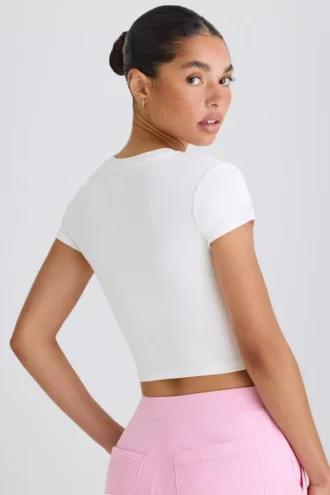 Kort T-shirt van stretchkatoenjersey met grafische print in wit