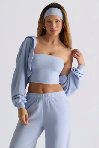 Korte bolero met capuchon van geborsteld jersey in zachtblauw