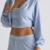 Korte bolero met capuchon van geborsteld jersey in zachtblauw