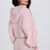 Korte hoodie met ritssluiting van zacht gebreid materiaal in zachtroze