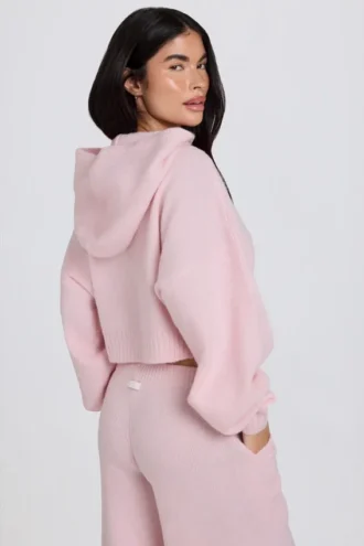 Korte hoodie met ritssluiting van zacht gebreid materiaal in zachtroze