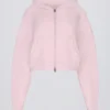 Korte hoodie met ritssluiting van zacht gebreid materiaal in zachtroze