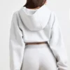 Korte hoodie van stretchkatoenfleece in grijs gemêleerd