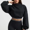 Korte hoodie van stretchkatoenfleece in zwart