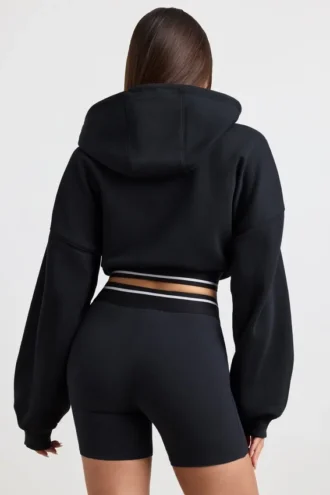 Korte hoodie van stretchkatoenfleece in zwart