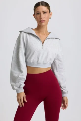 Korte sweater met kwartritssluiting in grijs gemêleerd